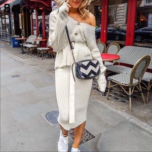 Elegant two piece women’s sweater dress suit.